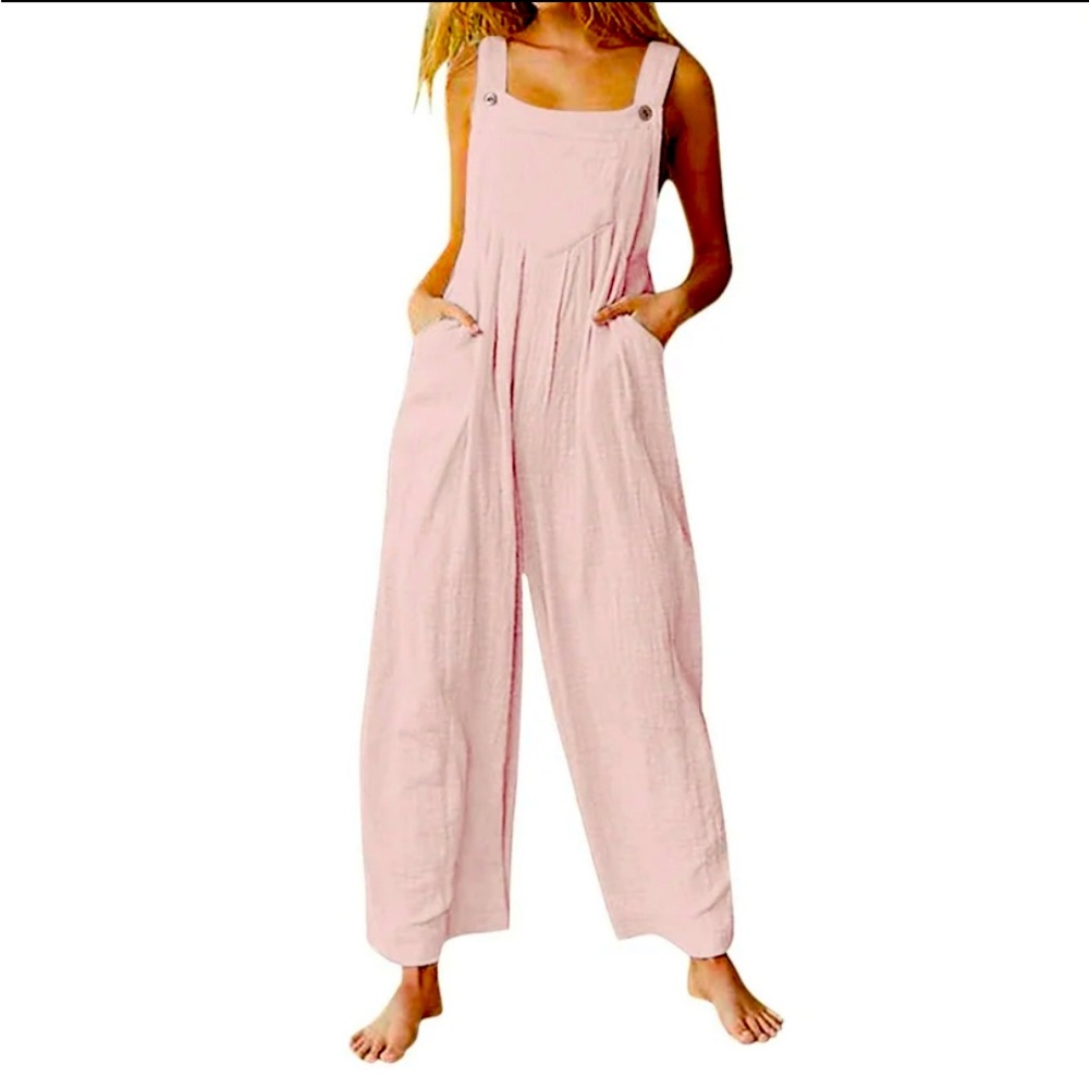 NWOTS! Blush jumper with pockets. Adjustable shoulder straps and zipper closure.